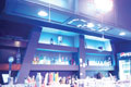 A little touch-up to a bar at a night club.  I desaturated the blues and made some brightness level adjustments, making it a much better quality picture.
